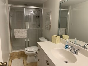 Shower, hair dryer, towels, soap