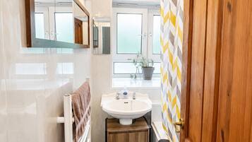 Hair dryer, towels, soap, shampoo