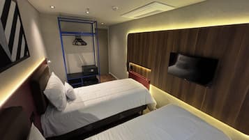 Habitación estándar, 2 camas individuales | Minibar y caja de seguridad en la habitación