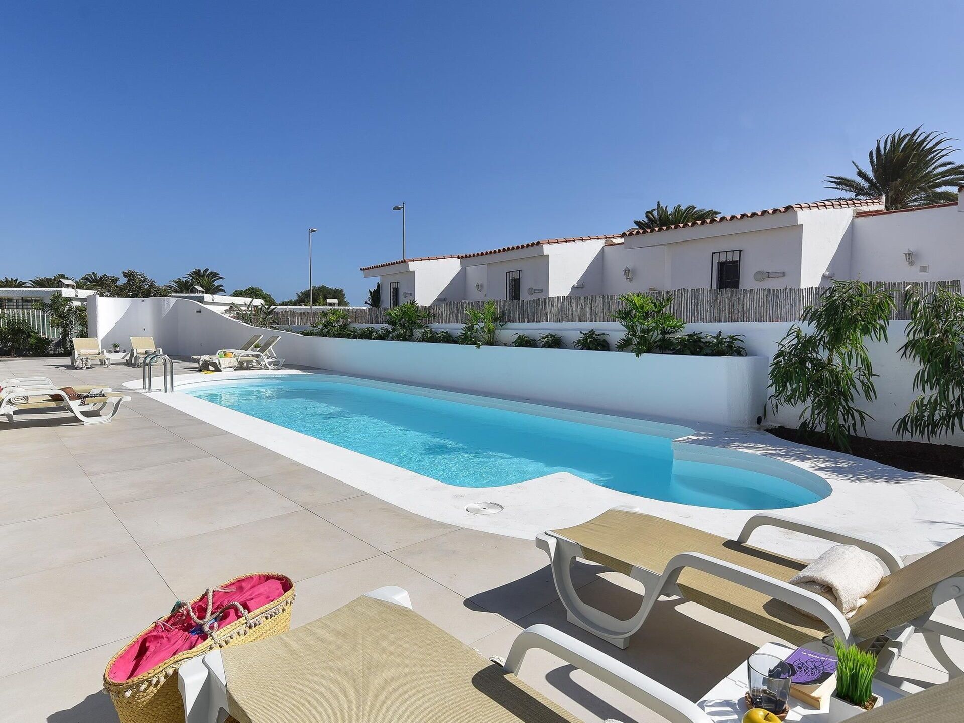 Sky, Property, Plant, Water, Swimming Pool, Building, Outdoor Furniture, Shade, Tree, Sunlounger