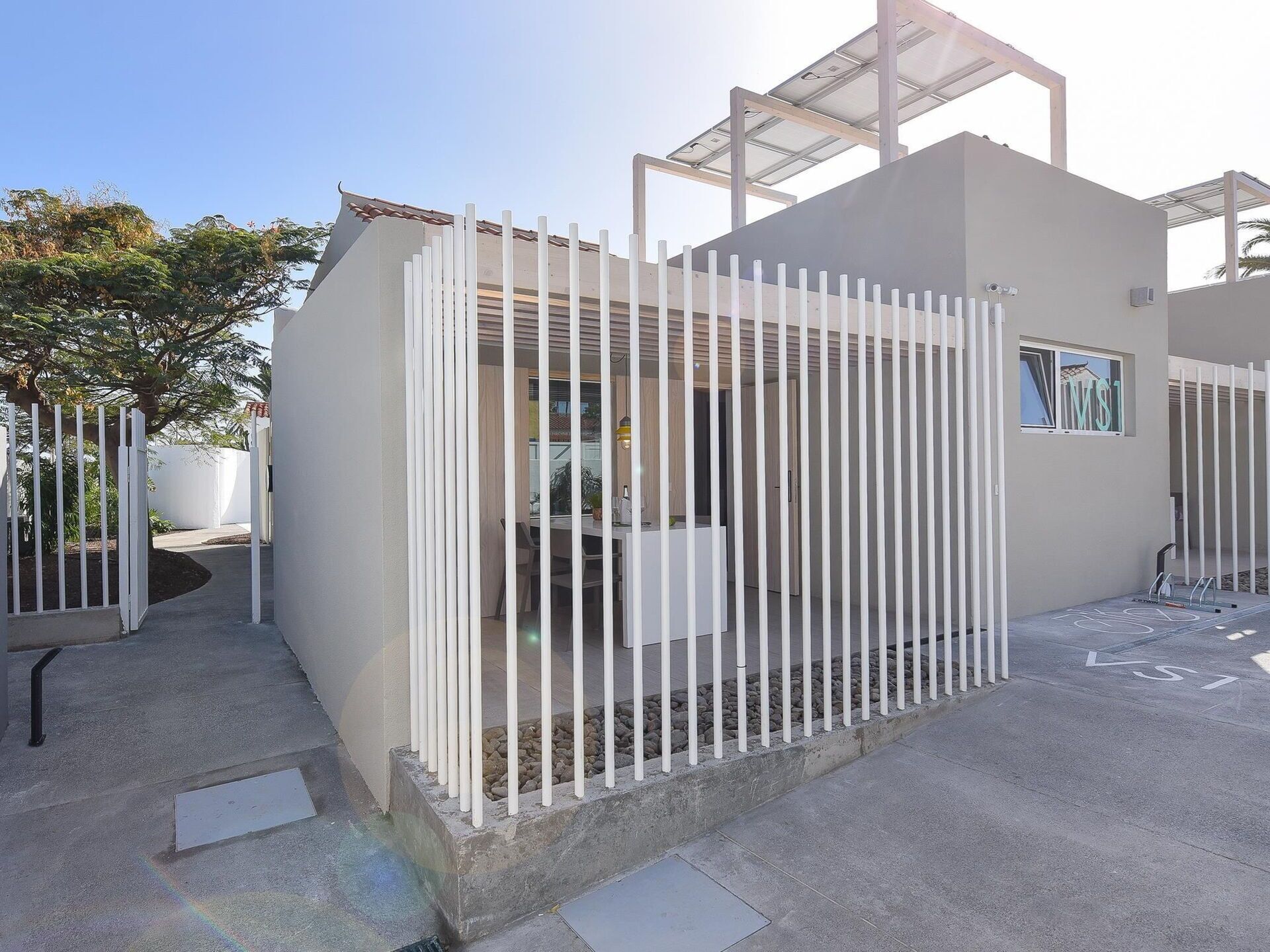 Sky, Urban Design, Composite Material, Tree, Material Property, Facade, Gas, Wood, City, Shade