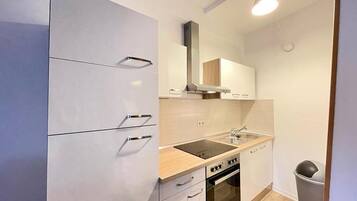 Oven, toaster, dining tables