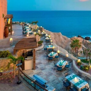 Outdoor dining - Enjoy a luxury oceanfront spa resort with fully equipped one bedroom! (Cabo San Lucas)