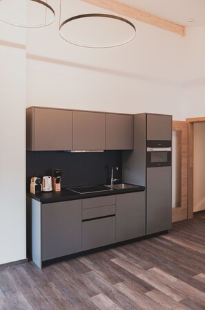 Microwave, dishwasher, dining tables