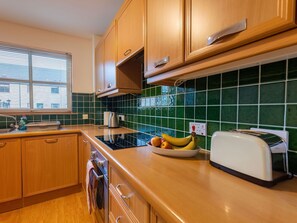 Microwave, oven, dining tables