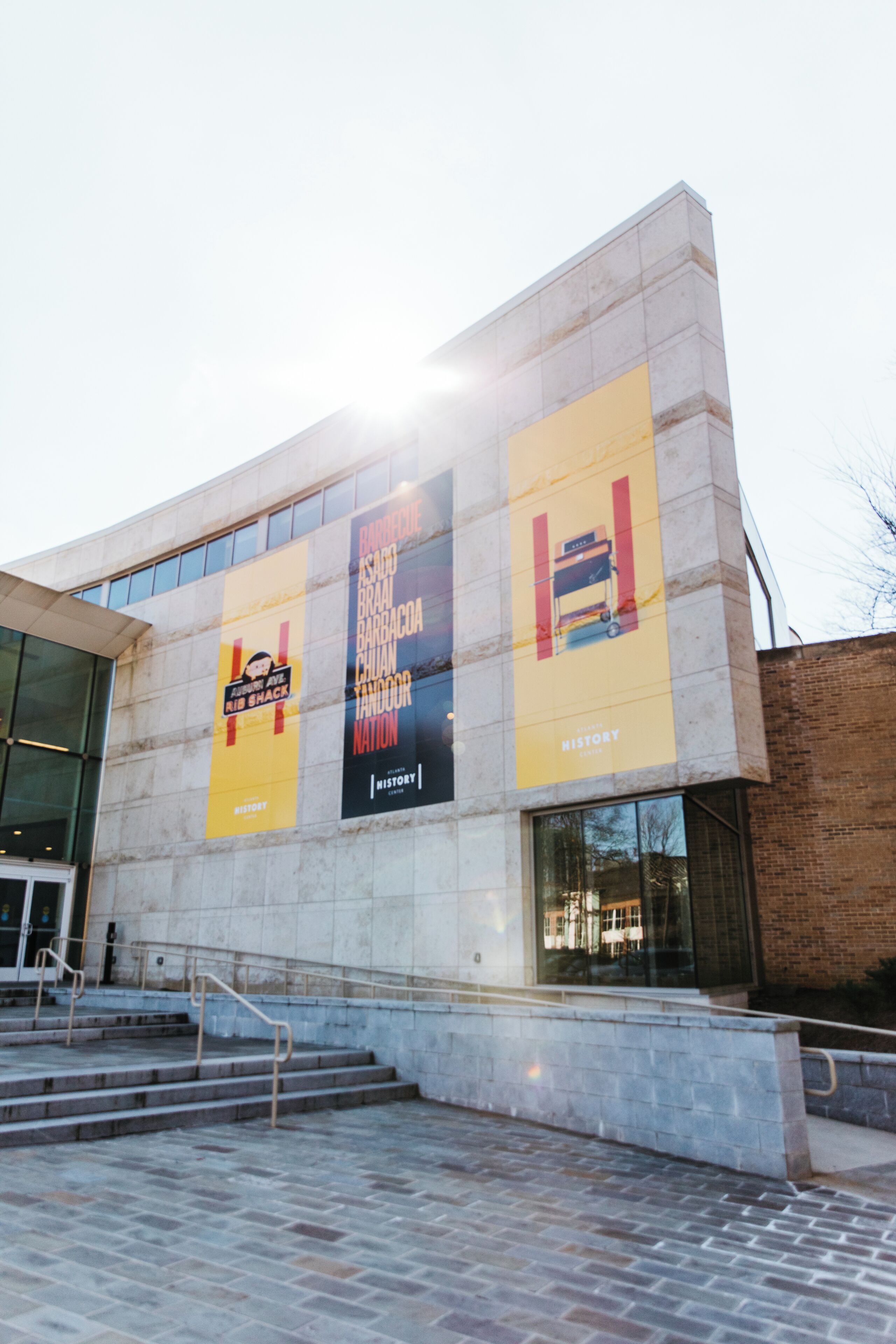 A building with large banners advertising events.