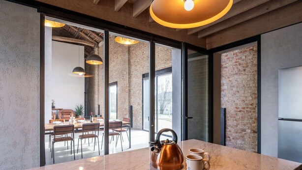 A modern kitchen with a marble countertop, a copper kettle, and two white mugs. - Beautiful private villa for 14 guests with private pool, WIFI, hot tub, A/C, TV and patio (Poirino)