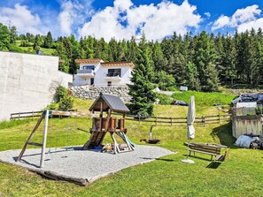 Enjoy a family-friendly stay with a playground area featuring a swing set and playhouse.