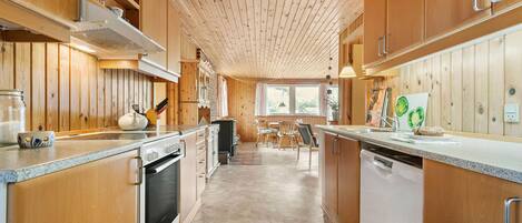 Fridge, stovetop, dishwasher, coffee/tea maker