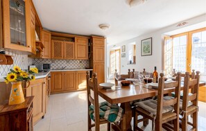 Dining - Nice home in Comano with house a mountain view (Comano)