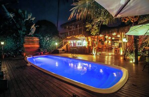 Outdoor pool, open 10:00 AM to 9:00 PM, pool umbrellas, pool loungers