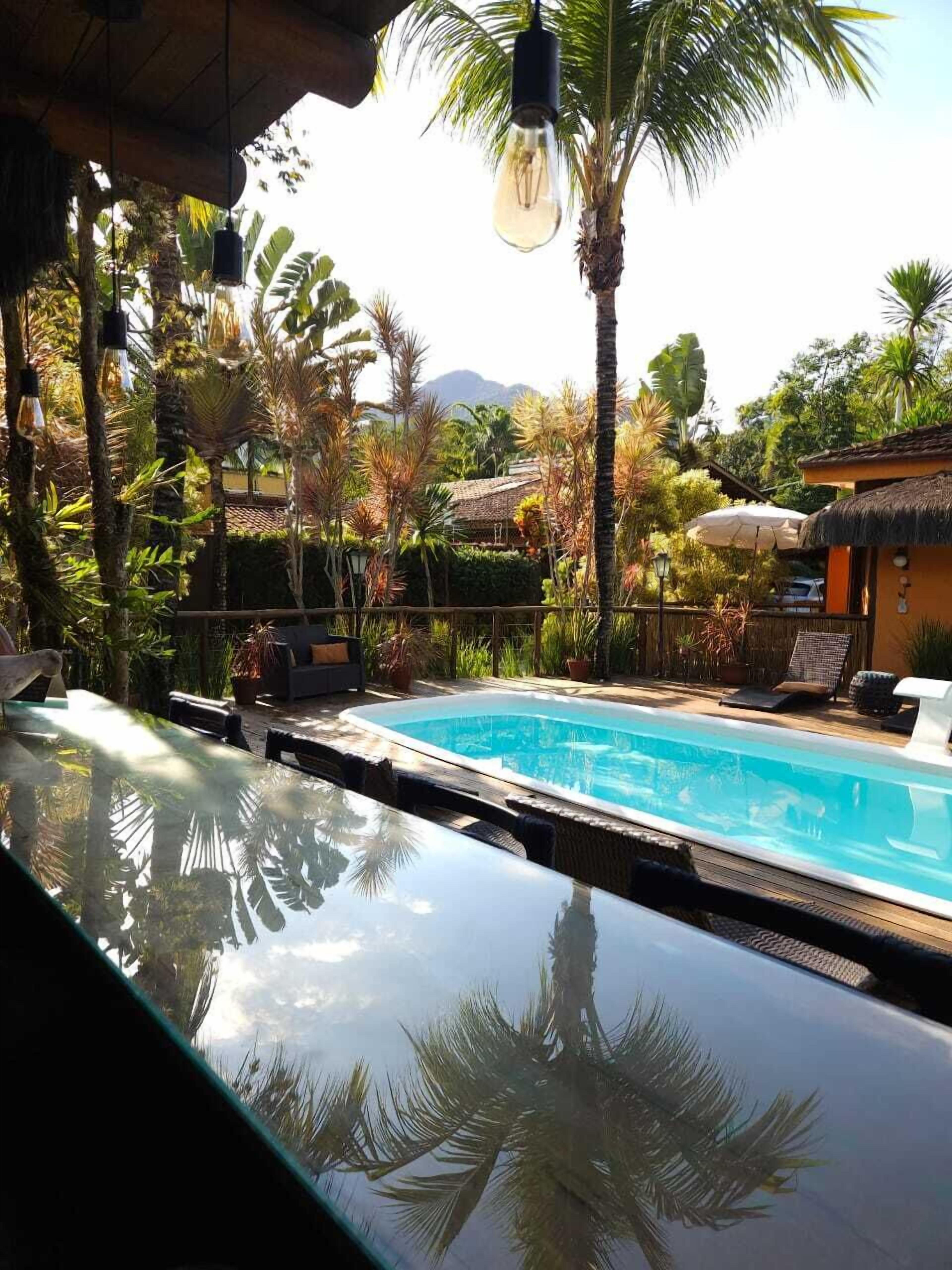 Outdoor pool, open 10:00 AM to 9:00 PM, pool umbrellas, sun loungers