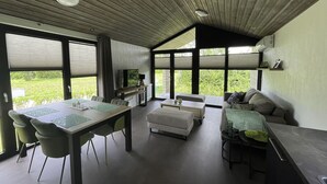 Living area - Beautiful private villa for 4 people with WIFI, pool, A/C, TV and terrace (Tholen)