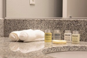 Hair dryer, towels, soap, shampoo