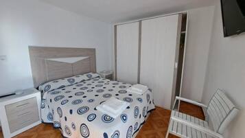 3 habitaciones, tabla de planchar con plancha y wifi gratis