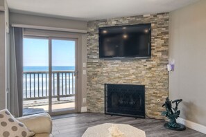 Smart TV, fireplace, books