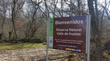 A welcome sign for Reserva Natural Valle de Iruelas.