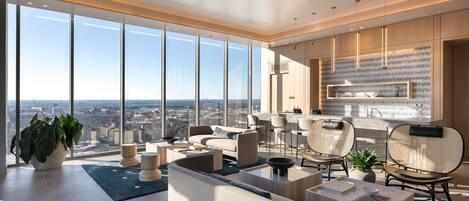 Sky deck lounge area with a bar and comfortable, lush seating