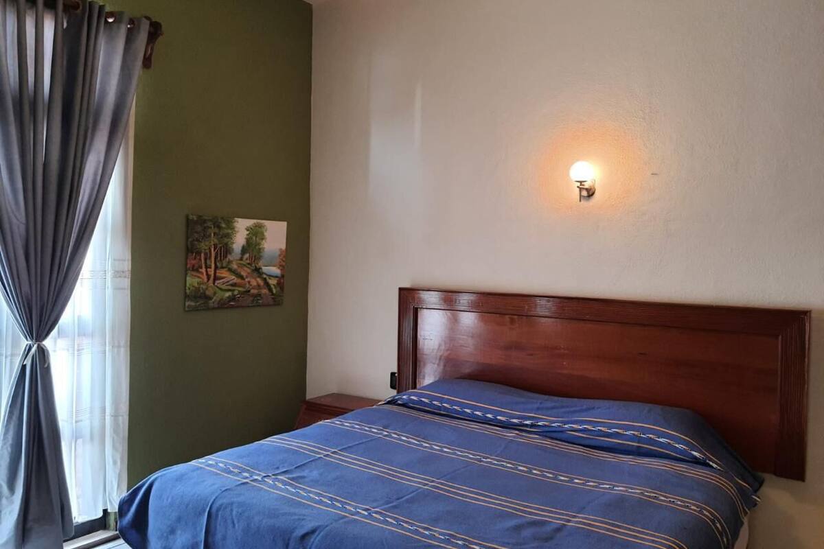 Quarto premium | 1 quarto, cortinas blackout, ferros/tábuas de passar roupa