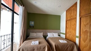 Family Room | 1 bedroom, blackout curtains, iron/ironing board (on request), free WiFi - Hotel Pueblo Grande (Patzcuaro)