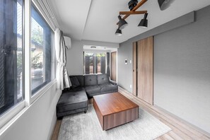 Basic Apartment | Living area | Flat-screen TV
