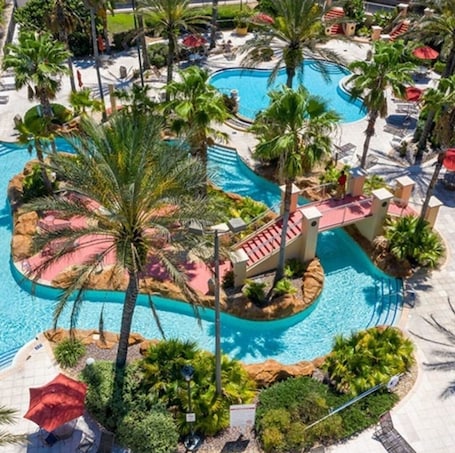 Outdoor pool, a heated pool. Paradise Room Resort Suite room near Disney and other interest places of Florida