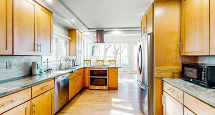 Three dog-friendly, waterfront cottages with full kitchens & private beach