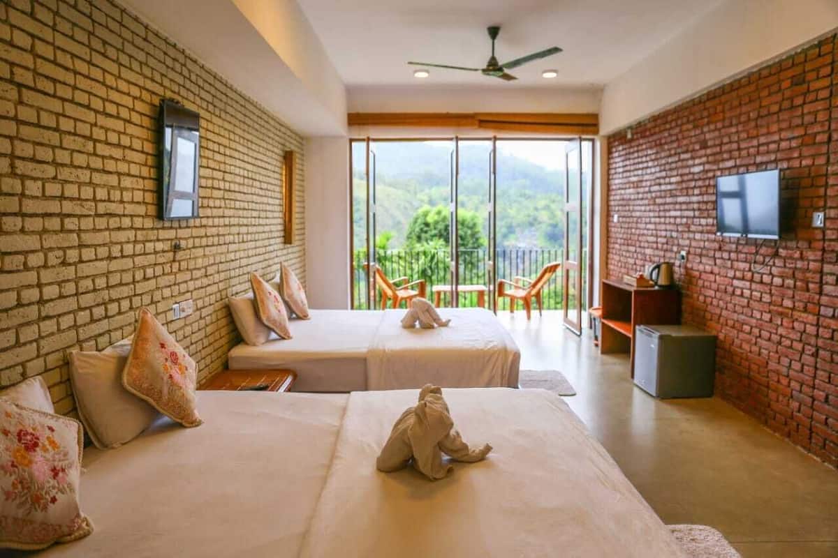 Deluxe Triple Room | Living area
