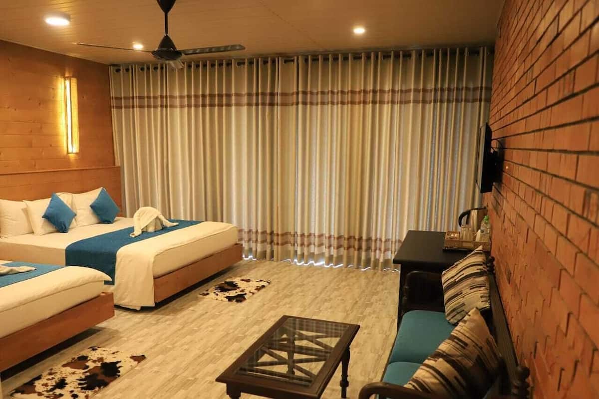 Deluxe Quadruple Room, 1 Bedroom, Non Smoking, Mountain View | Minibar, individually furnished, desk, laptop workspace