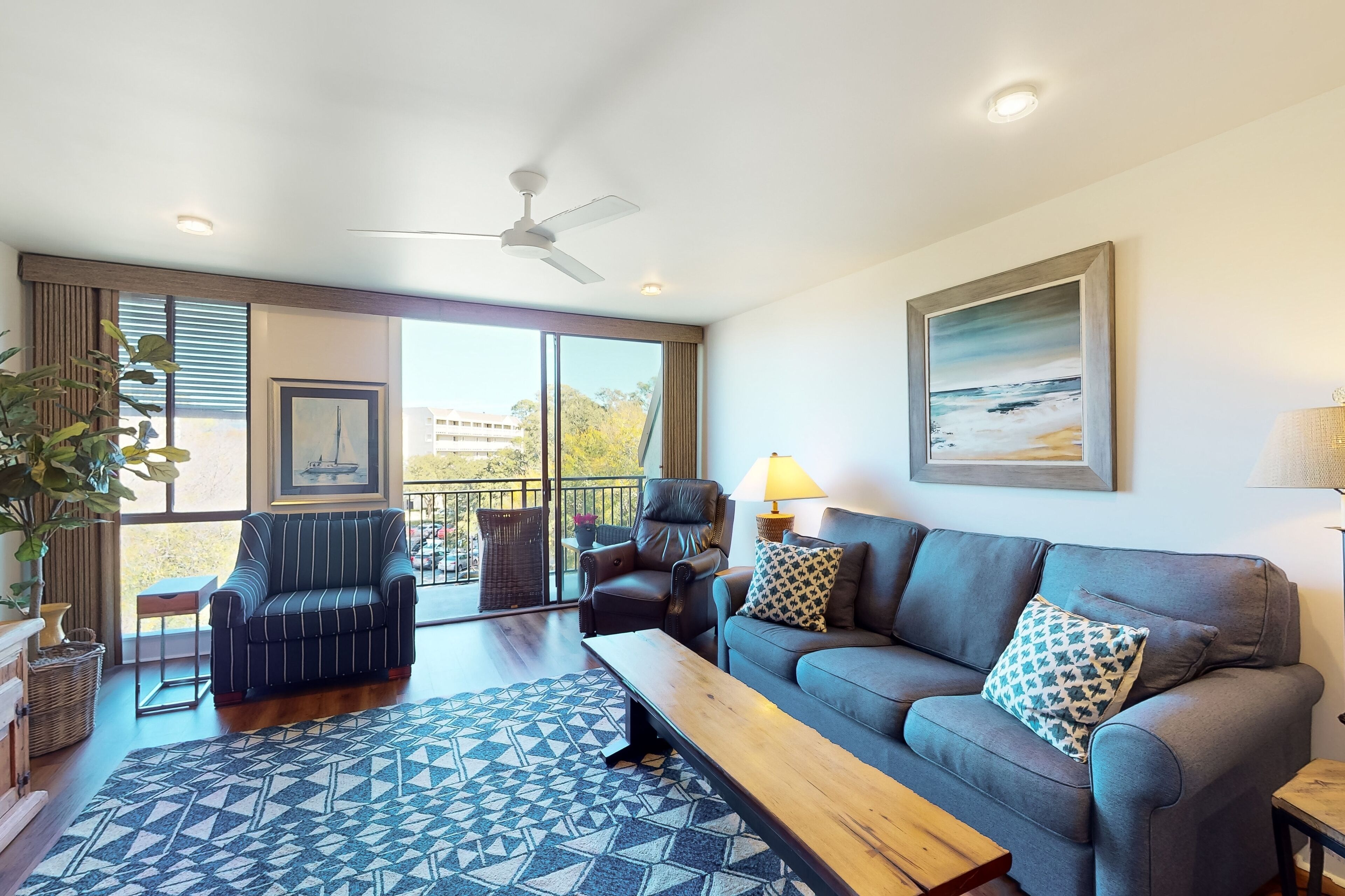 All-new, 4th-floor penthouse condo with private balcony, central AC, & W/D