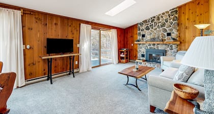Pond & mountain view cabin with fireplace, workstation, W/D, deck, & internet