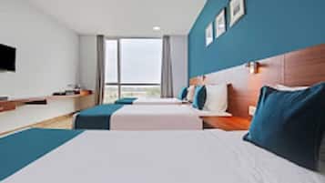 Suite junior | 1 habitación, escritorio, wifi gratis y ropa de cama