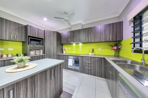 Modern Tropical Home with Pet Friendly Yard by Tropical BNB