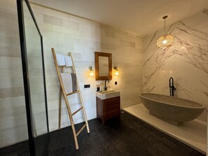 Shower, hair dryer, towels, soap
