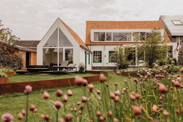 Relax in a serene setting surrounded by lush greenery and beautifully maintained gardens.
