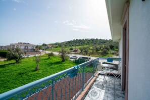 Junior Quadruple Room | Terrace/patio