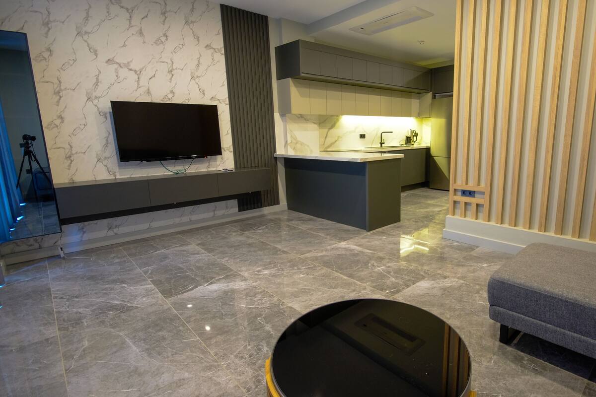 105-inch Smart TV with premium TV channels, heated floors