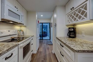 Fridge, microwave, dishwasher, coffee/tea maker