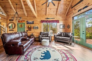 Télévision, cheminée, livres