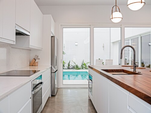 Modern Beach House: Steps to BEACH w/ Heated Pool