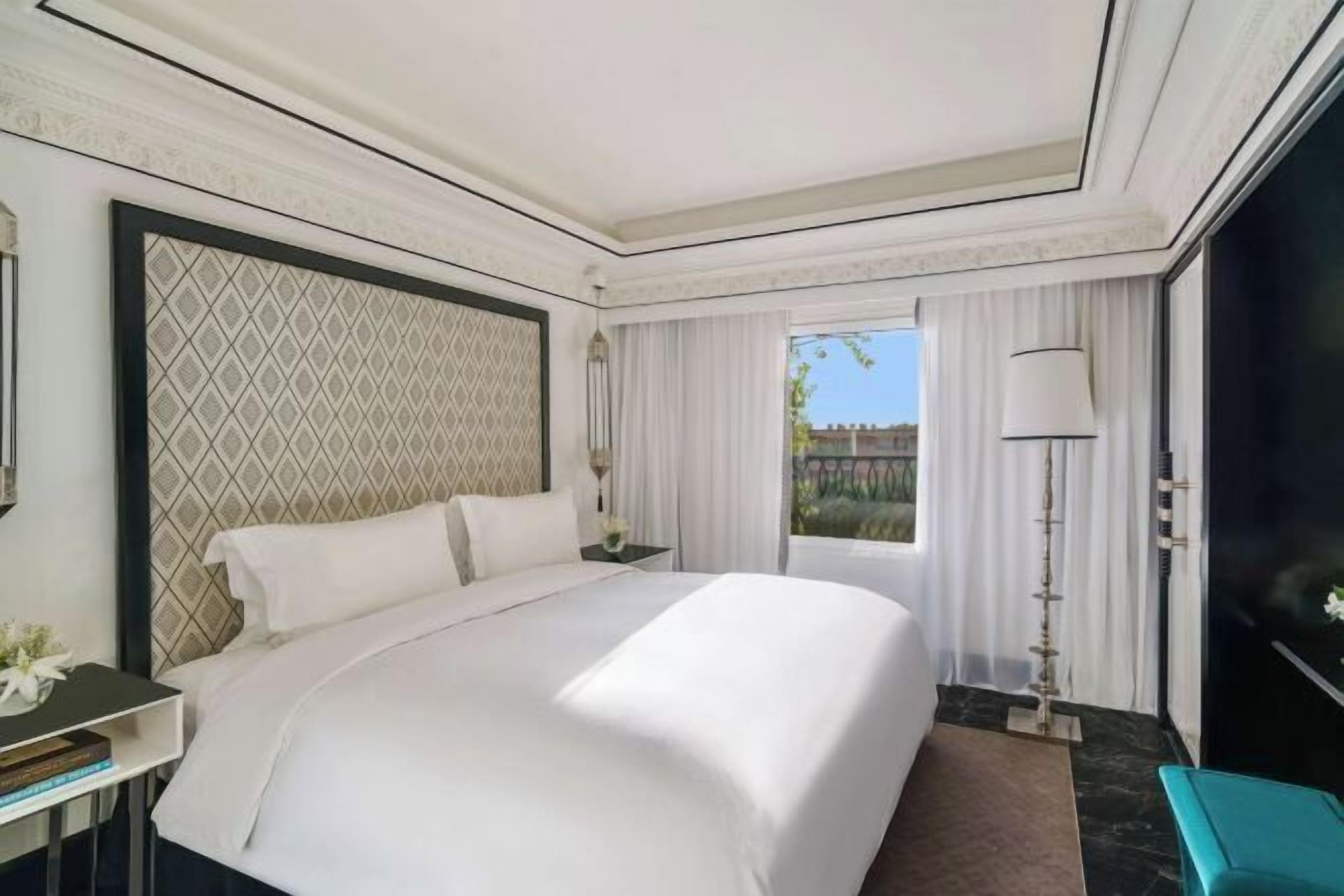 Premium bedding, down comforters, in-room safe, soundproofing