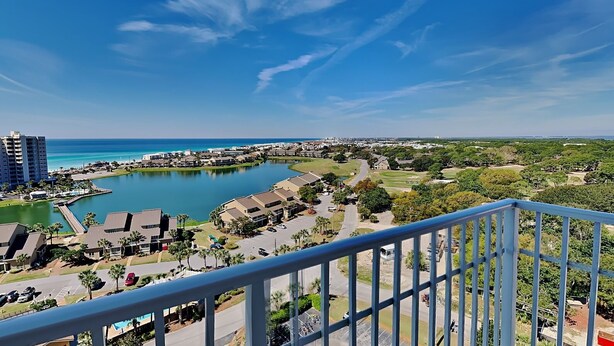 A coastal resort with a marina, beachfront properties, and a clear view of the ocean. - Ariel Dunes II #1310 | Gulf Views + Amazing Resort Amenities! (Miramar Beach)