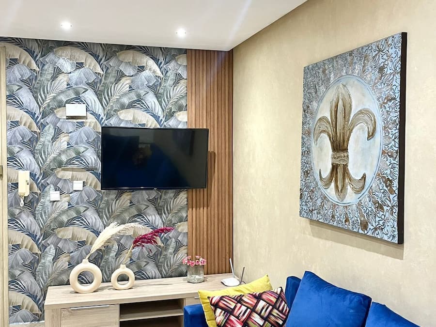 Apartamento conforto, 2 quartos | Área de estar