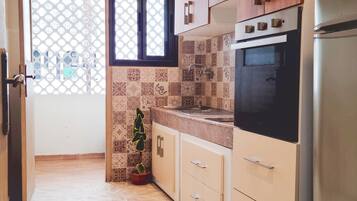 Comfort Apartment, 2 Bedrooms | Private kitchen | Fridge, stovetop, mixer, toaster oven