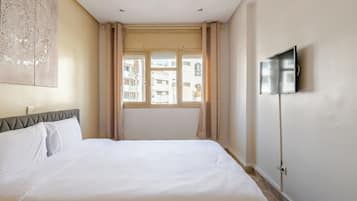 Apartamento Confort, 2 habitaciones | 2 dormitorios, cortinas opacas, tabla de planchar con plancha