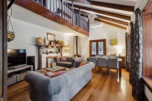 TV, fireplace - Escape to tranquility at Serenity House & Wellness Spa. (Pemberton)