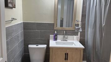 Hair dryer, towels, soap, toilet paper