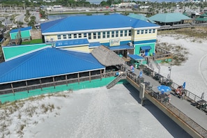 A building with a blue roof and a sign reading 'Allison's.'