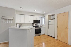 Private kitchen - Hip Historic Baker Area Condo - Individual Garage Parking Included! (Denver)