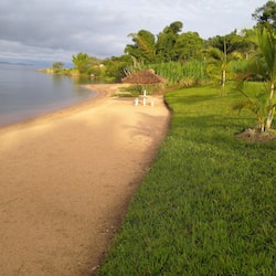 Private beach, white sand, beach umbrellas, beach towels